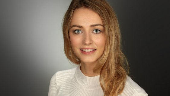 Porträtaufnahme der interviewten Person.