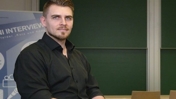 Porträtaufnahme der interviewten Person.