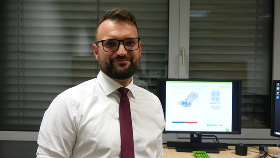 Porträtaufnahme der interviewten Person.